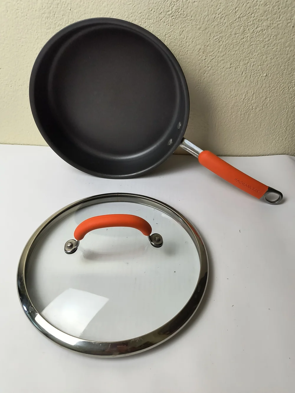 Rachael Ray 3QR/2.8L Black Sauté Pan with Orange Silicone Handle and Lid Grip